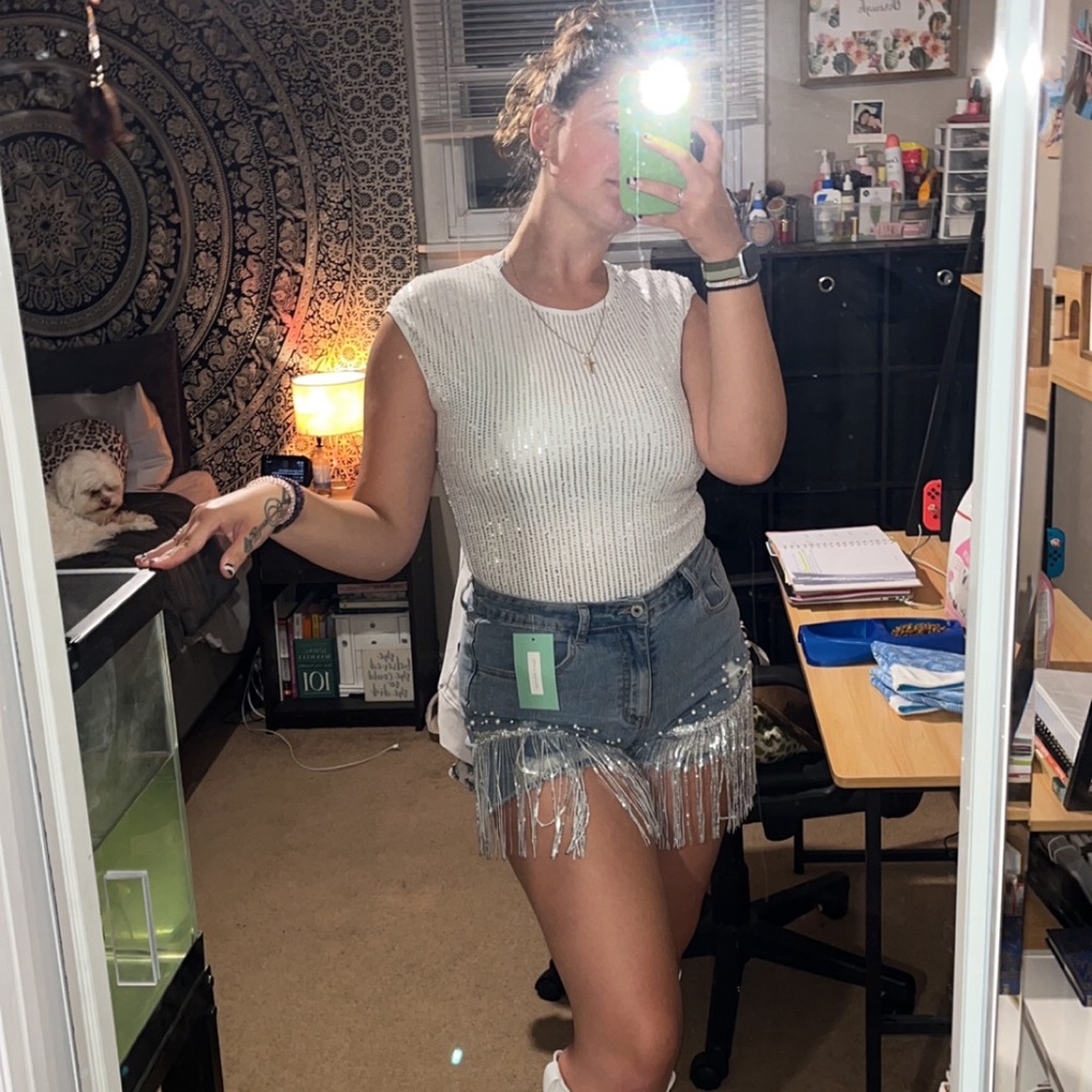 Body suit and shorts together as an outfit